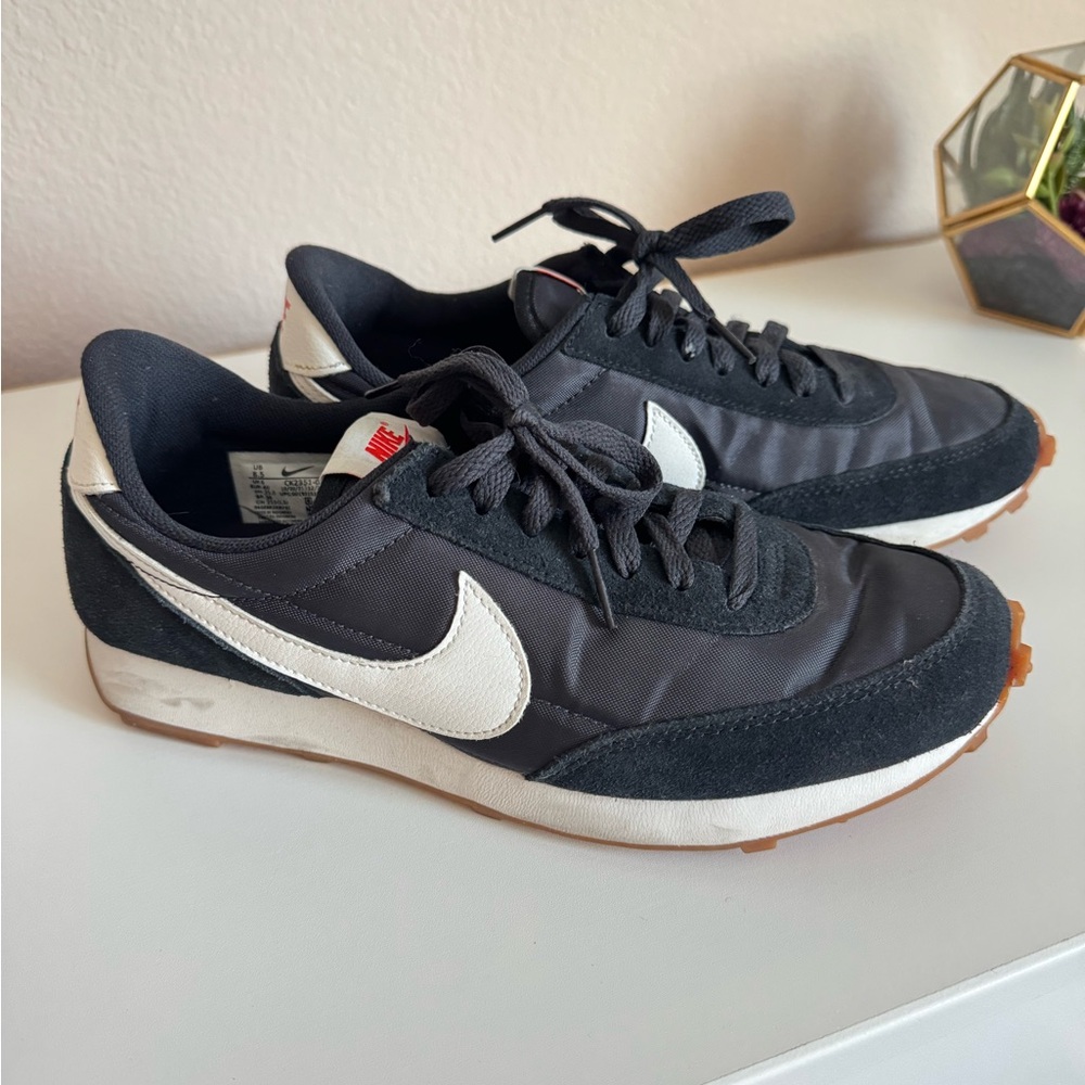Nike Daybreak sneakers in 8.5. Gently used. Black & white with gum sole.